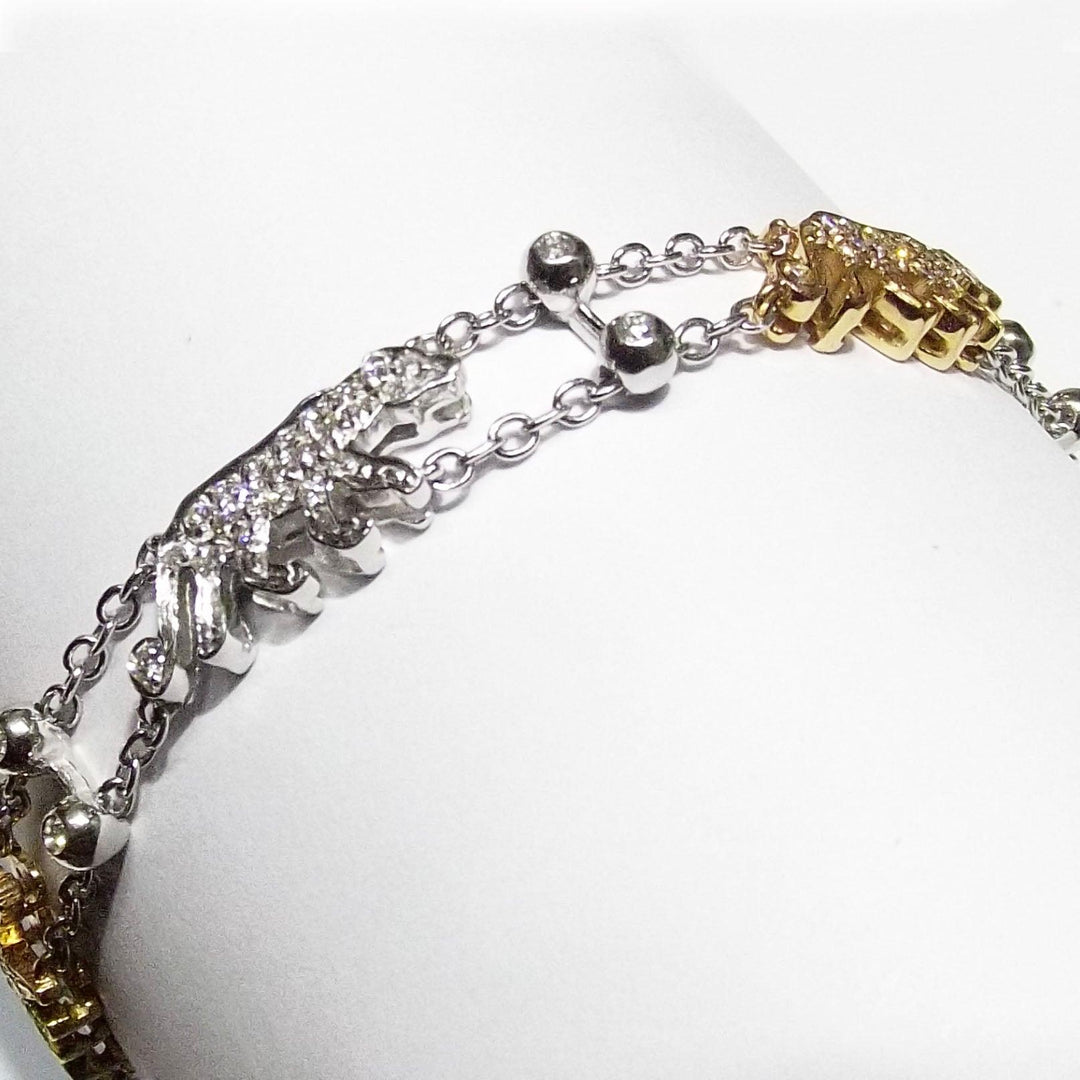 Taverna bracciale Pantere oro bianco e giallo 18kt diamanti - Capodagli 1937